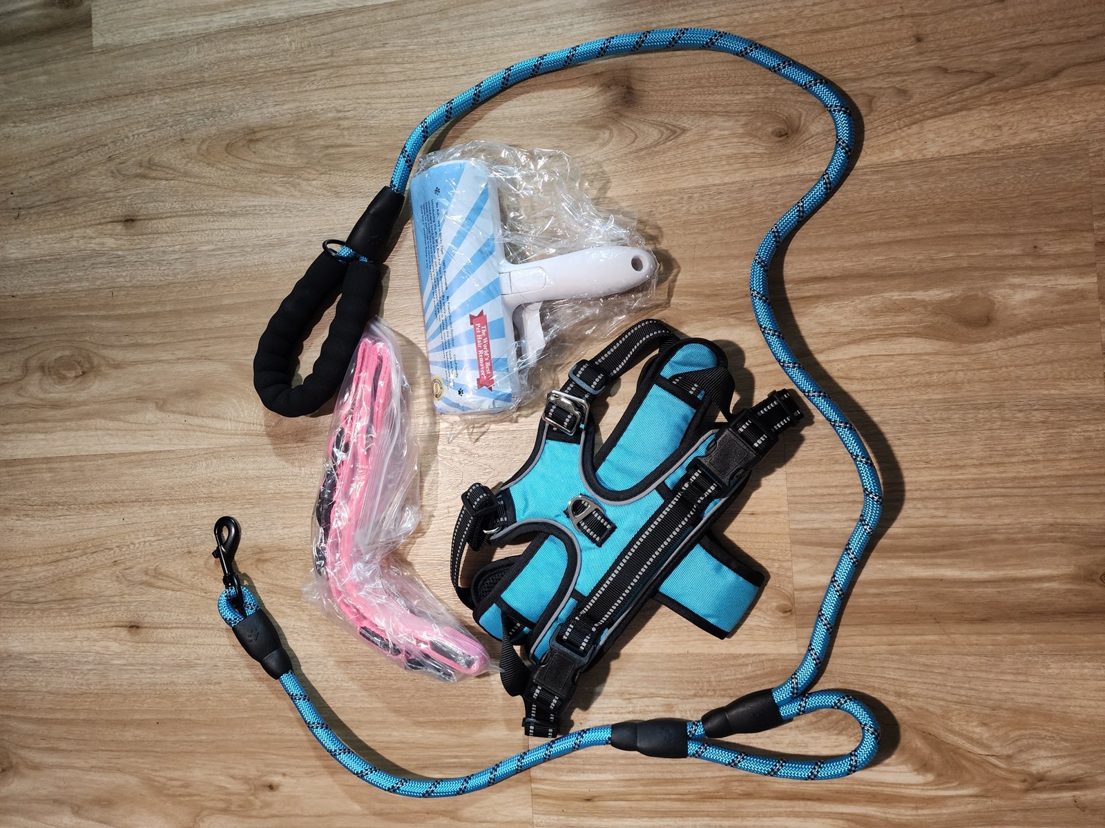 3 Piece Dog Harness Kit, No Pull Padded Reflective Harness with Handle, Heavy Duty Rope Leash and Reusable Pet Hair Remover, Small Medium Large XL Blue large dog harness kit laid out with leash and pet hair remover
